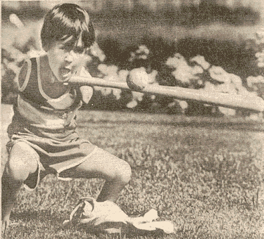 Newspaper clipping of me playing ball as a child